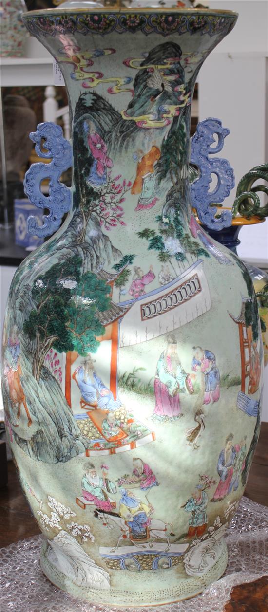 A massive Chinese famille rose foreign ambassadors vase, Daoguang period (1821-50), 77.5cm, some damage to neck and foot